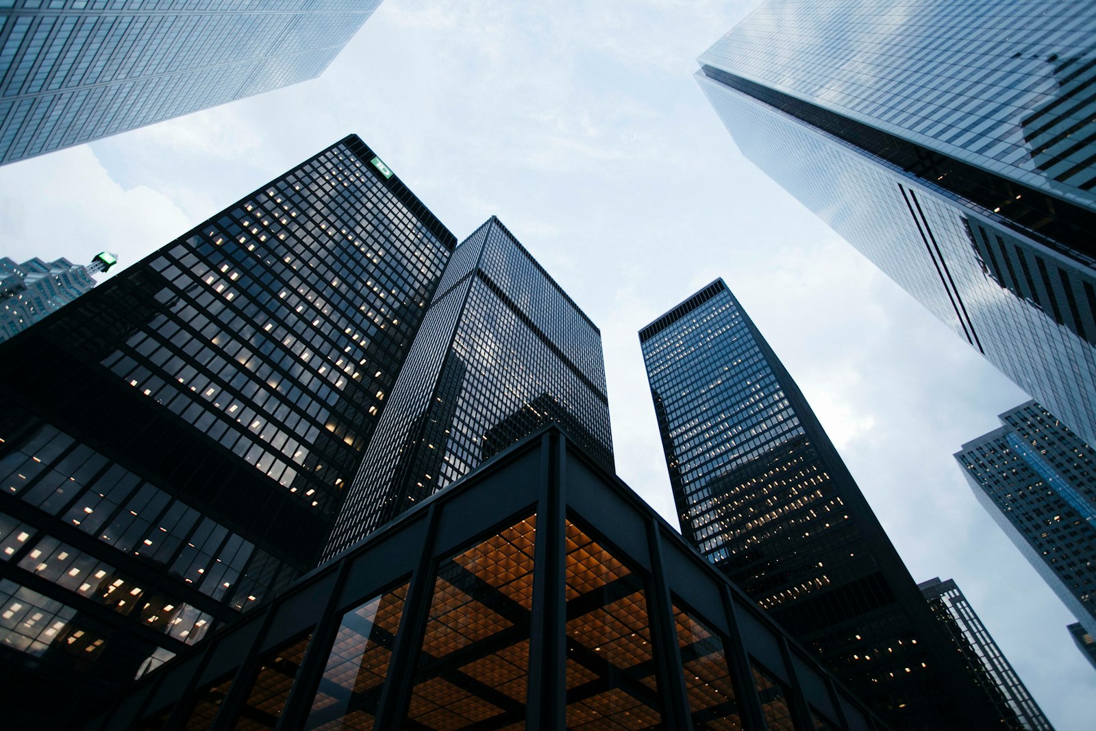 low angle photo of city high rise buildings during daytime- How to Sell a Business?