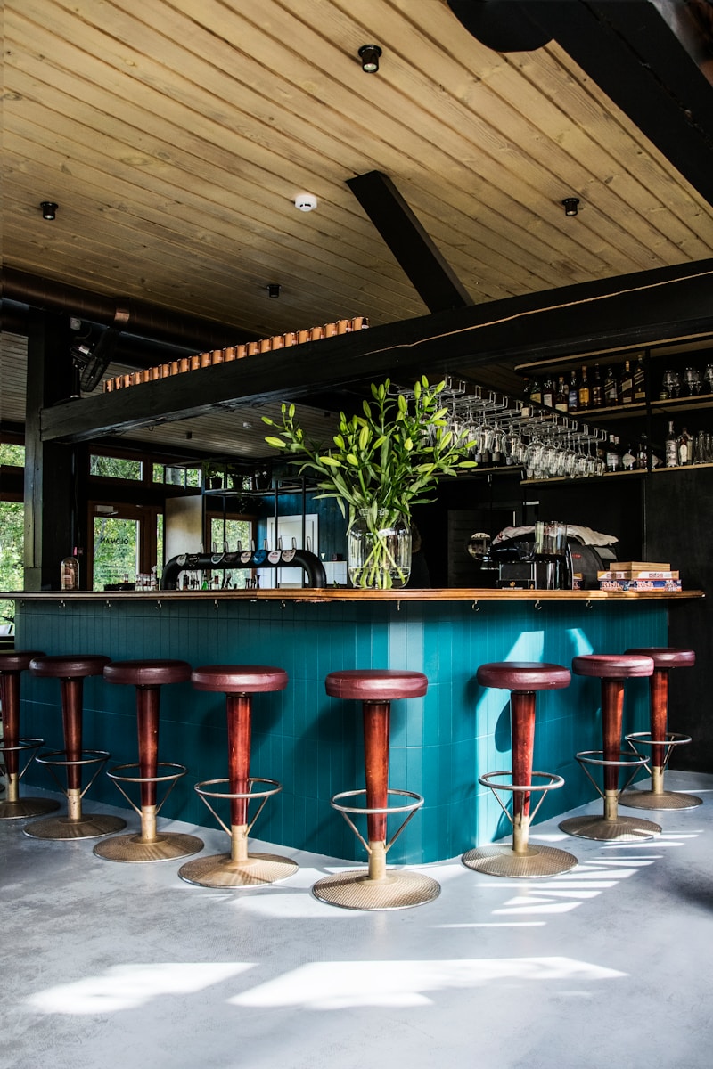 empty bar chairs during daytime